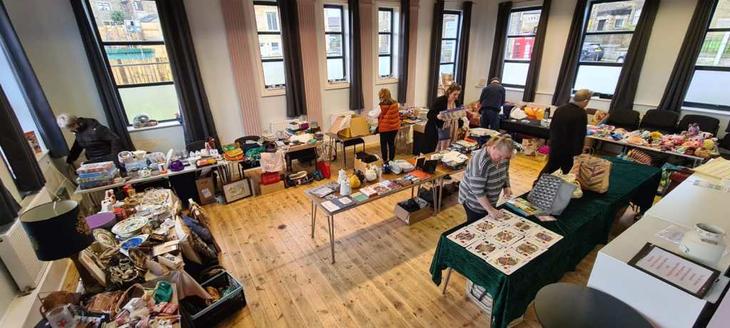 Tables in the process of being set up for the table top sale