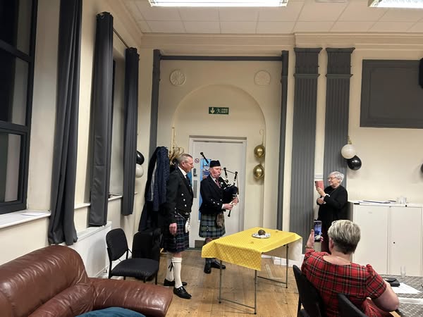 two men in traditional scottish dress
